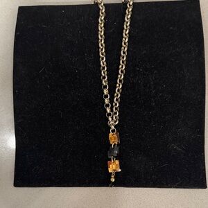 Elegant Gold and Black Necklace